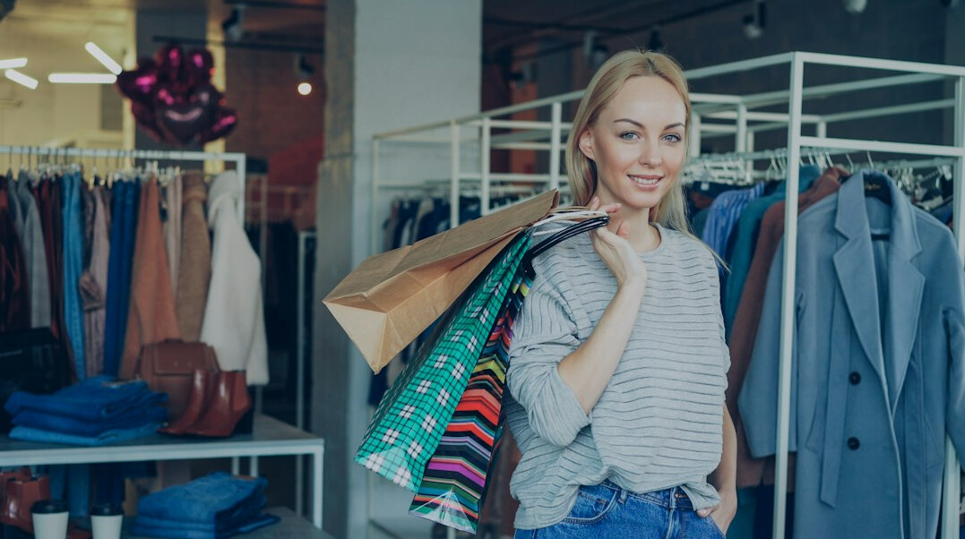 woman hiding item in bag